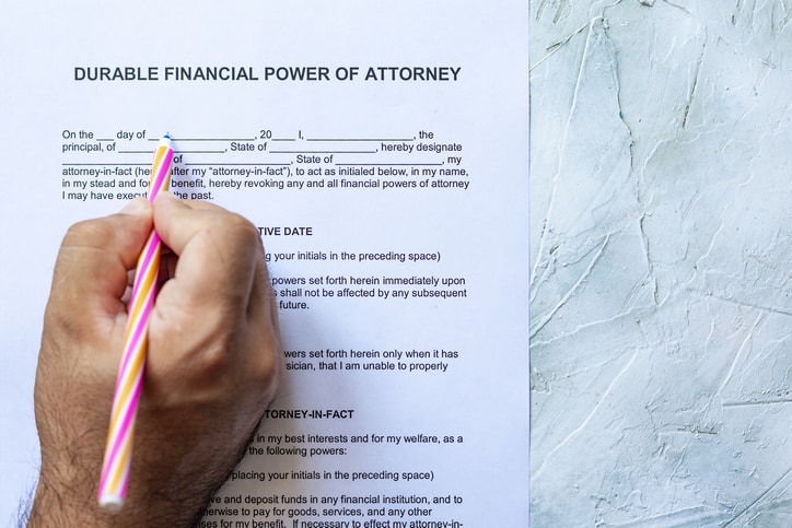 What is the difference between a springing vs a durable power of attorney?